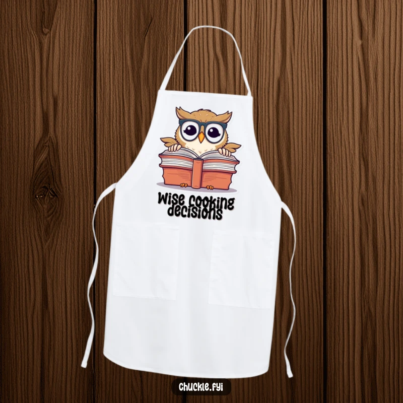 Funny chuckling owl wearing spectacles, peeking over a book, on a kitchen apron.