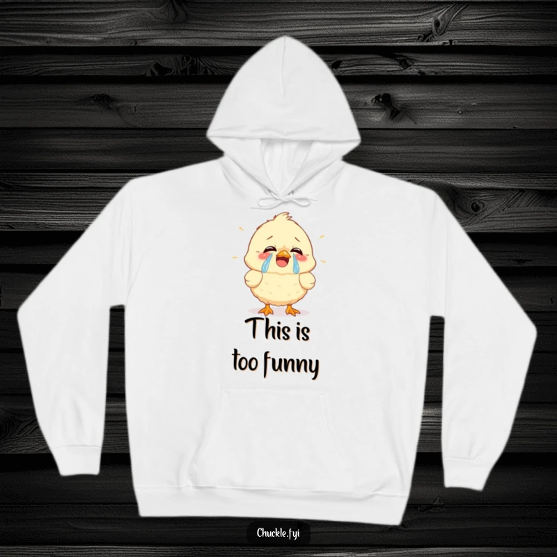 Funny hoodie with a fluffy chick cracking up, tears of joy streaming, offering warm, humorous comfort and a cheerful look.