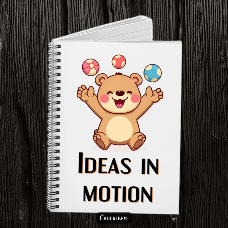 Funny notebook cover with a cheerful bear character joyfully juggling three colorful balls, a wide smile evident. Organized and fun writing.